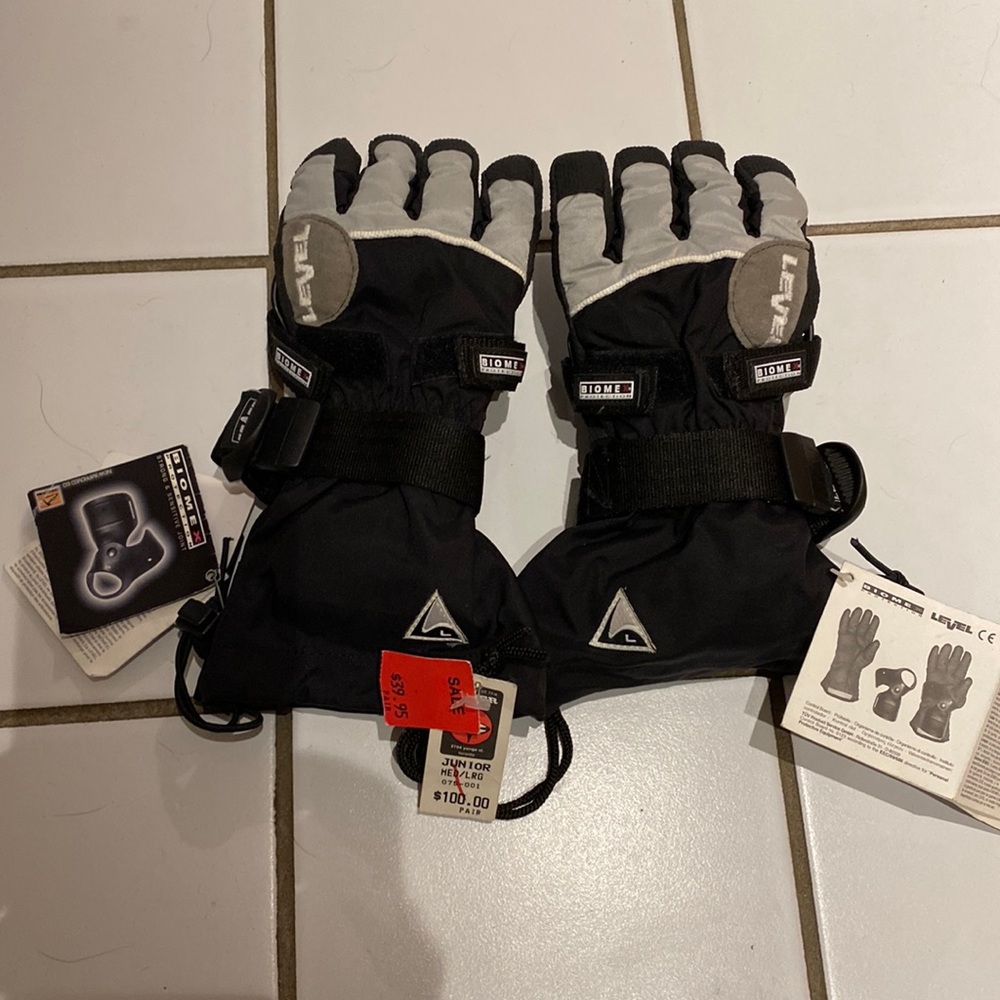 Brand new with tags still on youth snow board or ski gloves by Level Biome X